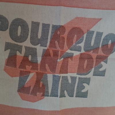 un panneau de laine ave écrit "pourqoi tant de laine"