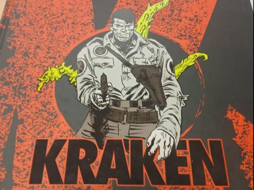 Un homme avec pistolet sur fond rouge écrit Kraken